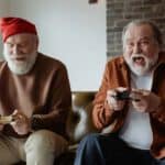 senior men playing video games