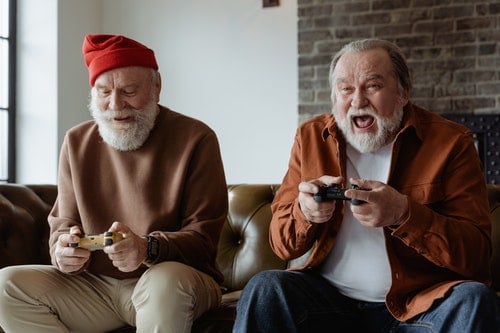 senior men playing video games